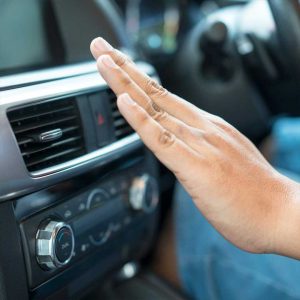 mechanic-diagnosing-why-car-ac-is-not-blowing-cold-air-at-oceanside-repair-shop